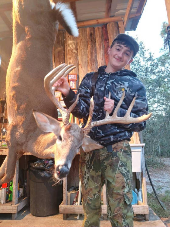 JRwithTrophyBuck.jpg